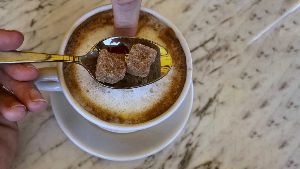 You can use small amount of brown sugar in coffee.