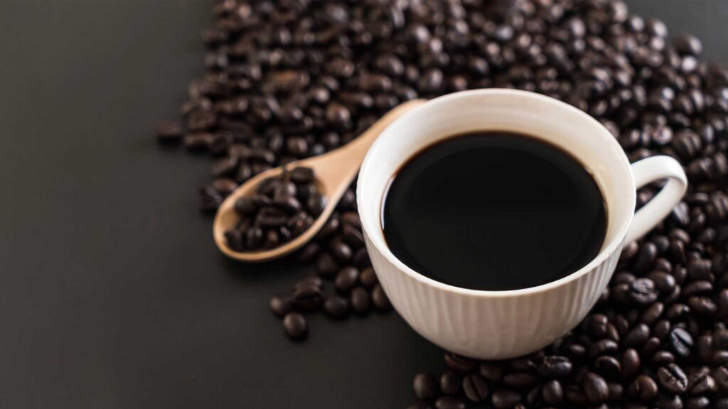 How does dark roasted coffee effect  the acidic level.