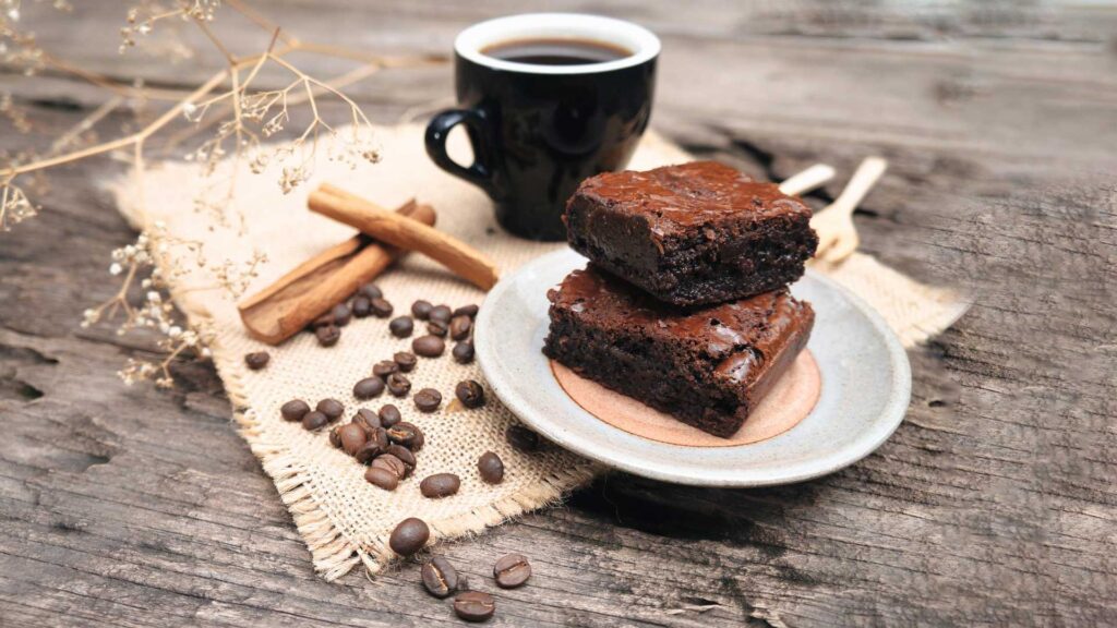 Fudge brownies and coffee are a great pair together.