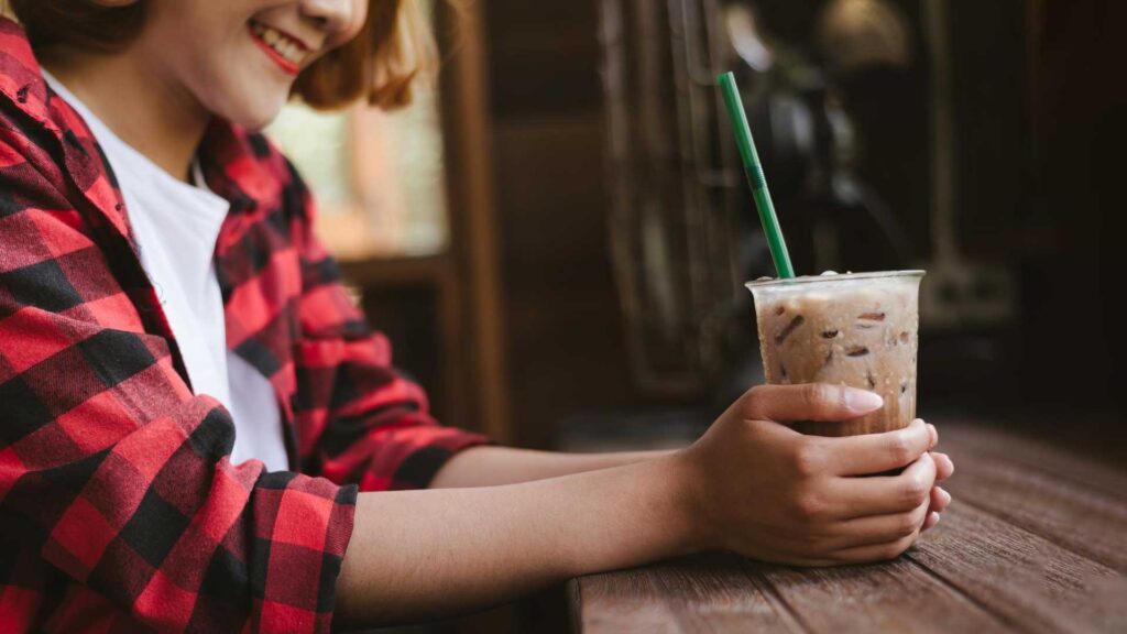 Use straw for drinking coffee to prevent stains on teeth whitening strips..